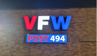 A sign on a brick wall
AI-generated content may be incorrect.