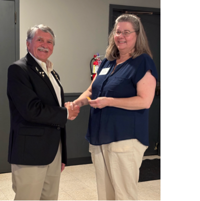 A person and person shaking hands
AI-generated content may be incorrect.